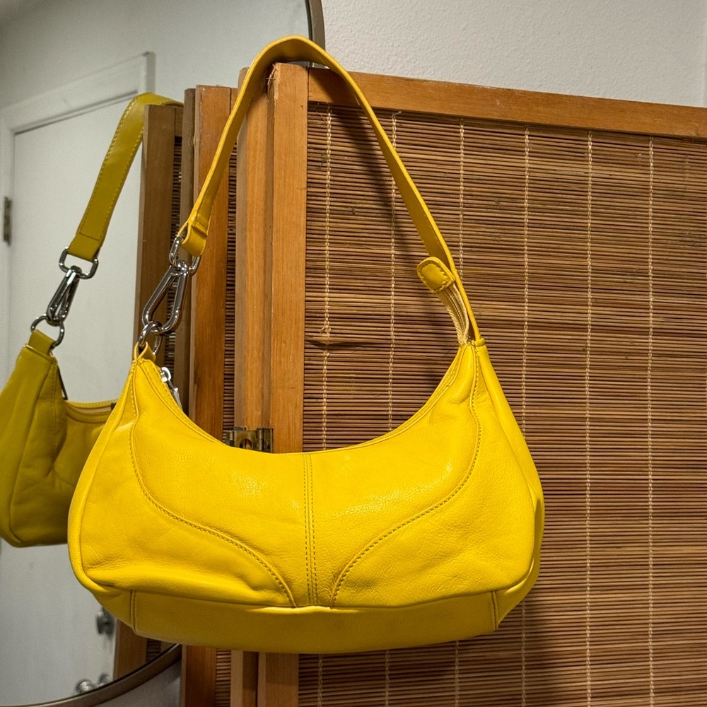 Yellow Wilson’s leather purse